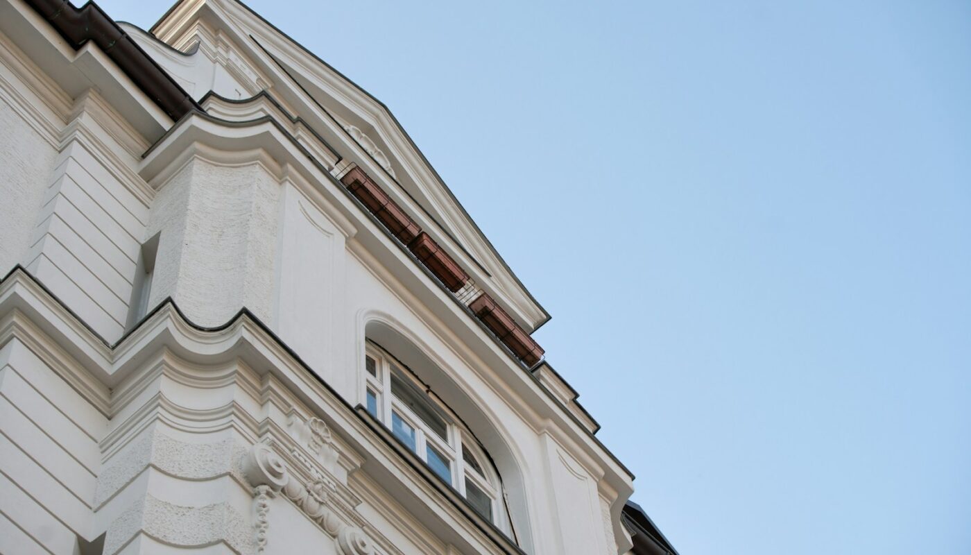 white concrete building under blue sky during daytime
